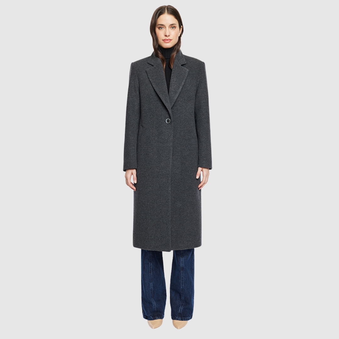 Introducing our carbon chic women's Italian wool cashmere blend jacket, perfect for winter. This single-breasted coat features a regular shoulder and a masculine-inspired fit, offering a chic yet timeless look. With a notch collar and back vent, it combines classic style with comfort. Single welt pockets add practicality, making this jacket an essential piece for any wardrobe. Ideal for women's fashion, it seamlessly blends warmth and sophistication.