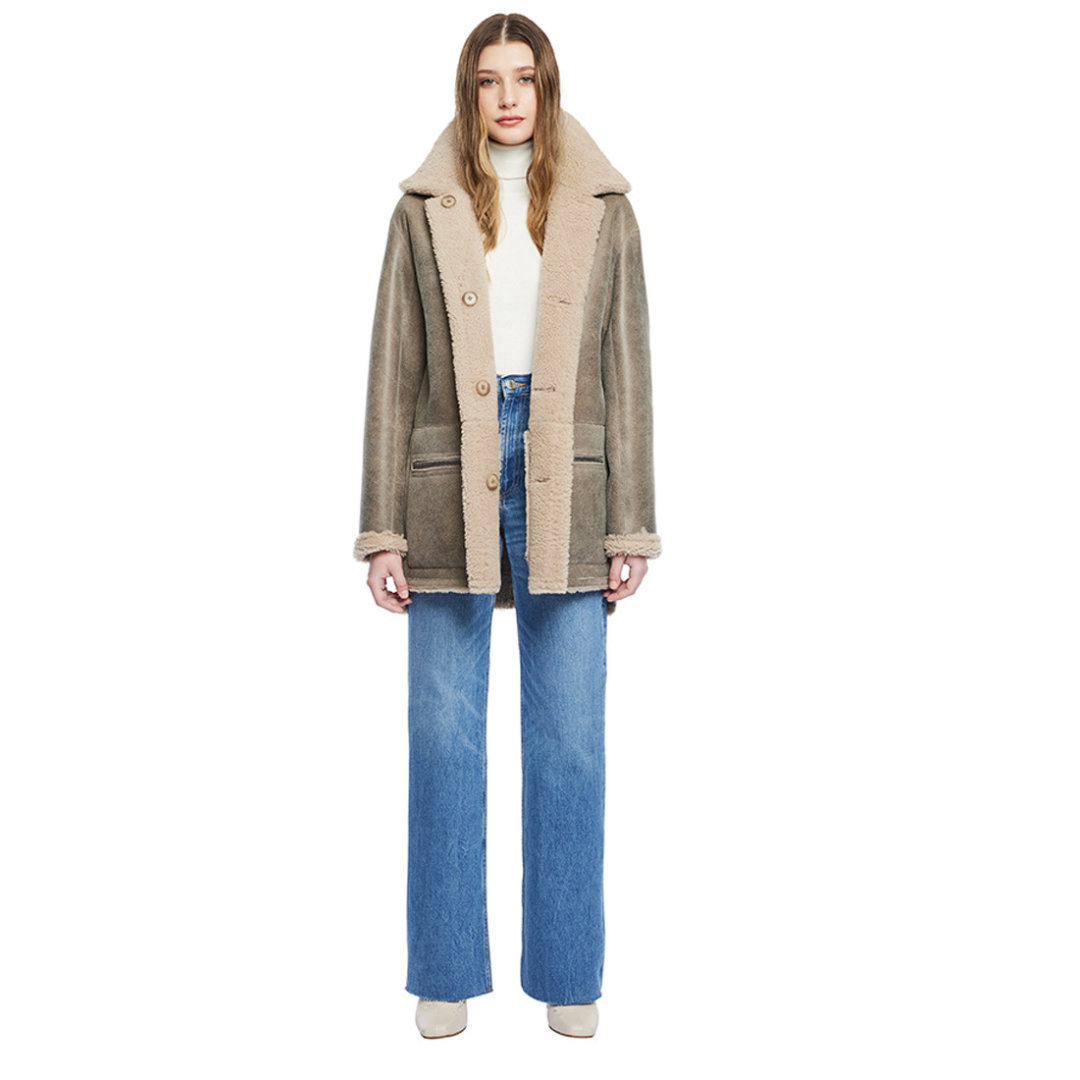 Reversible nappa shacket Reverses to curly wool teddy Drop shoulder High-low hemline Notch collar Side zip pockets on nappa side Side patch pockets on curly wool side 4 button closure