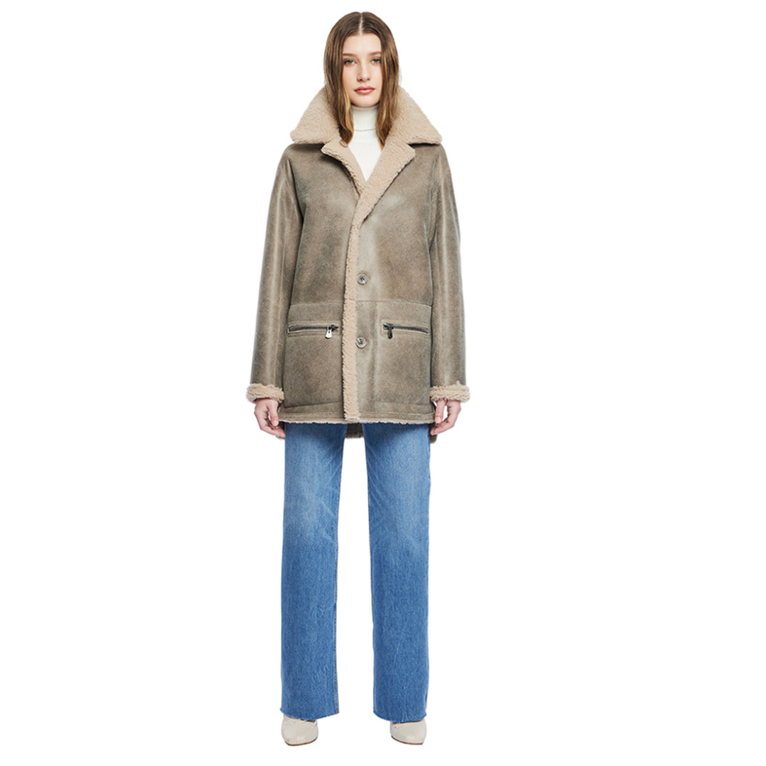 Reversible nappa shacket Reverses to curly wool teddy Drop shoulder High-low hemline Notch collar Side zip pockets on nappa side Side patch pockets on curly wool side 4 button closure