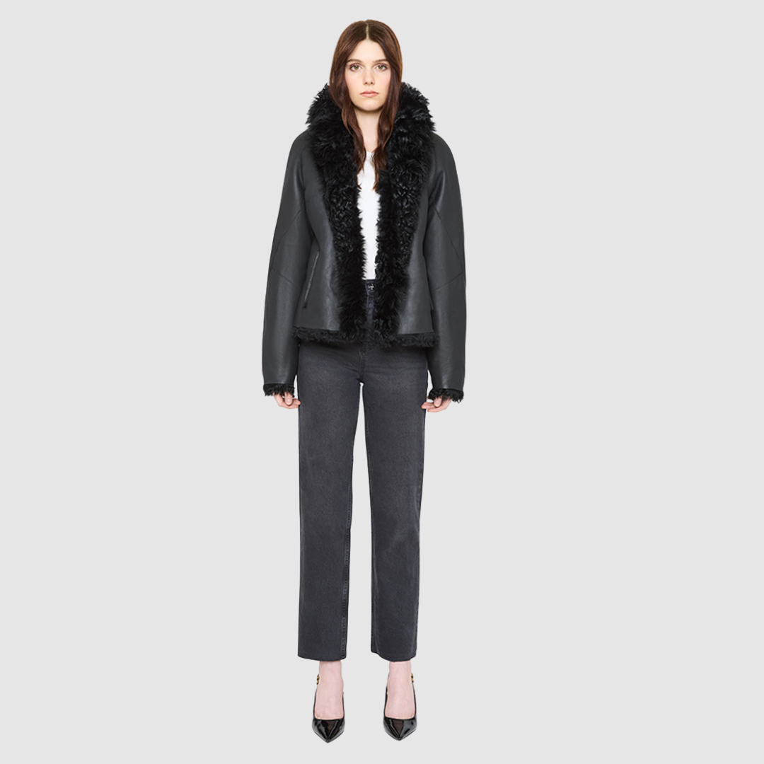 The HiSO CUPID Jacket is a heritage-inspired mid-length shearling jacket, masterfully crafted from premium semi-curly shearling wool for rich texture and dimension. Its regular shoulder and relaxed mid-length silhouette create a sleek, contemporary fit, while the dramatic, oversized stand collar offers an elevated, modern aesthetic. Designed with a versatile, reversible layout, this statement piece offers two distinctive looks in one