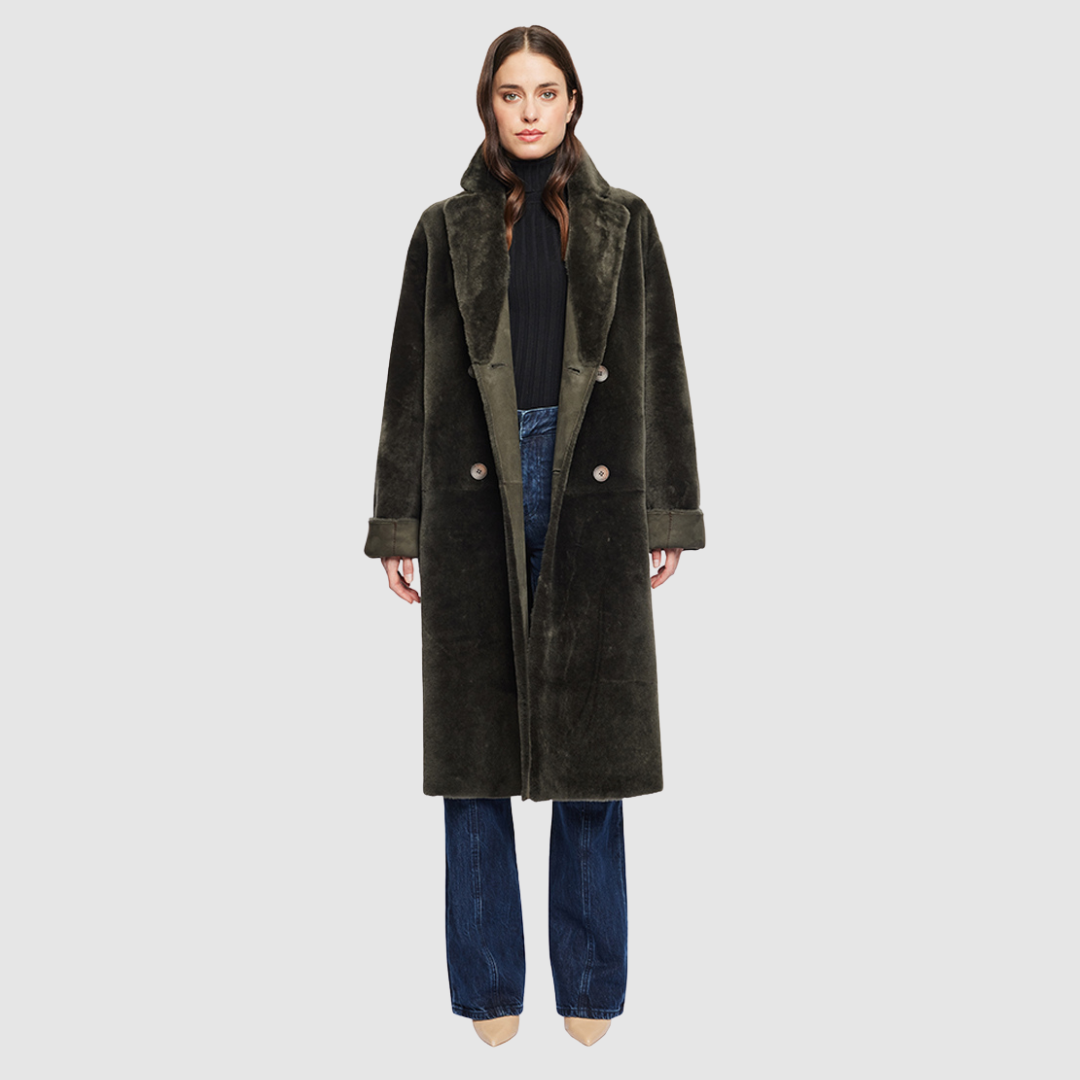 The ELLE Coat is a heritage-inspired oversized reversible shearling piece crafted in khaki suede and ironed wool teddy. Designed to transition seamlessly from smooth suede to plush wool-out texture