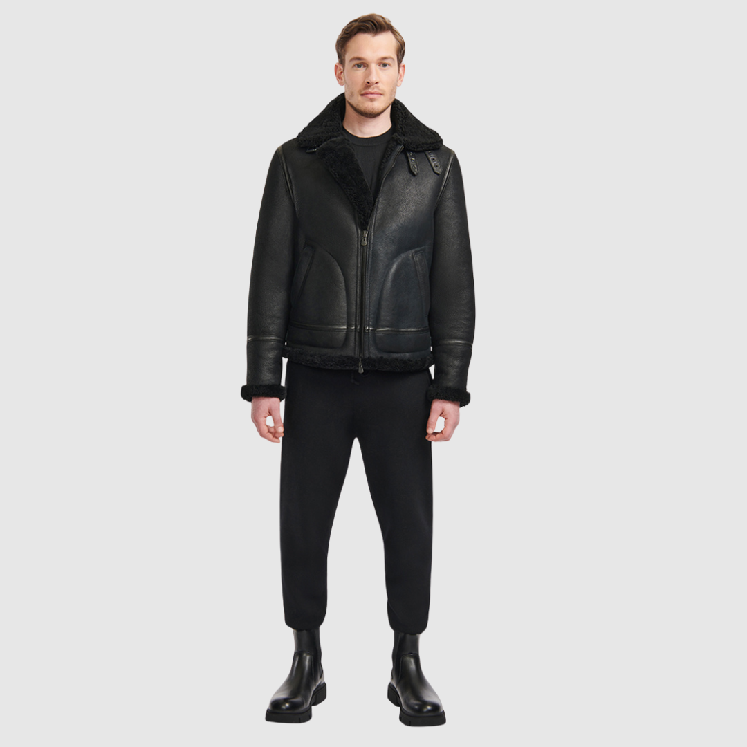 Classic nappa aviator shearling Curly wool collar and trims Large welt pockets and stitch detail Buckle details on collar and waistband Zipper closure Standard fit