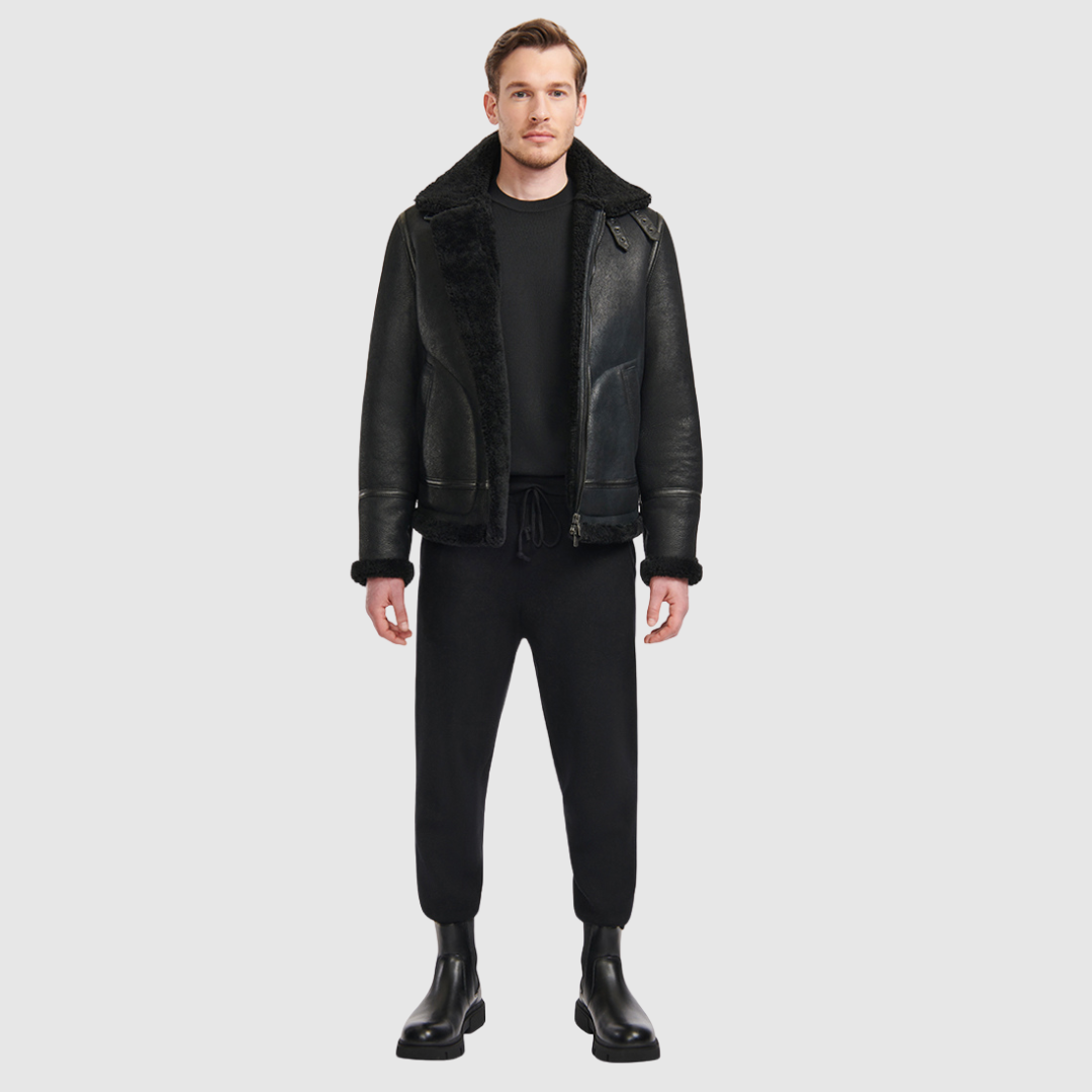 Classic nappa aviator shearling Curly wool collar and trims Large welt pockets and stitch detail Buckle details on collar and waistband Zipper closure Standard fit