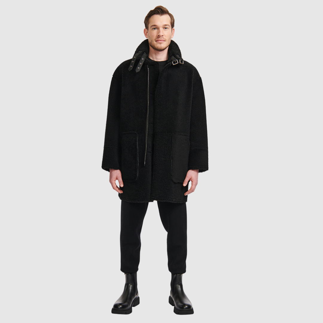 Oversized reversible nappa moto Reverses to a curly wool teddy Drop shoulder Oversized fit through shoulders, arms and body Notch collar with buckle details Single welt side pockets on nappa side Patch side pockets on curly wool teddy side Front zip and button closure