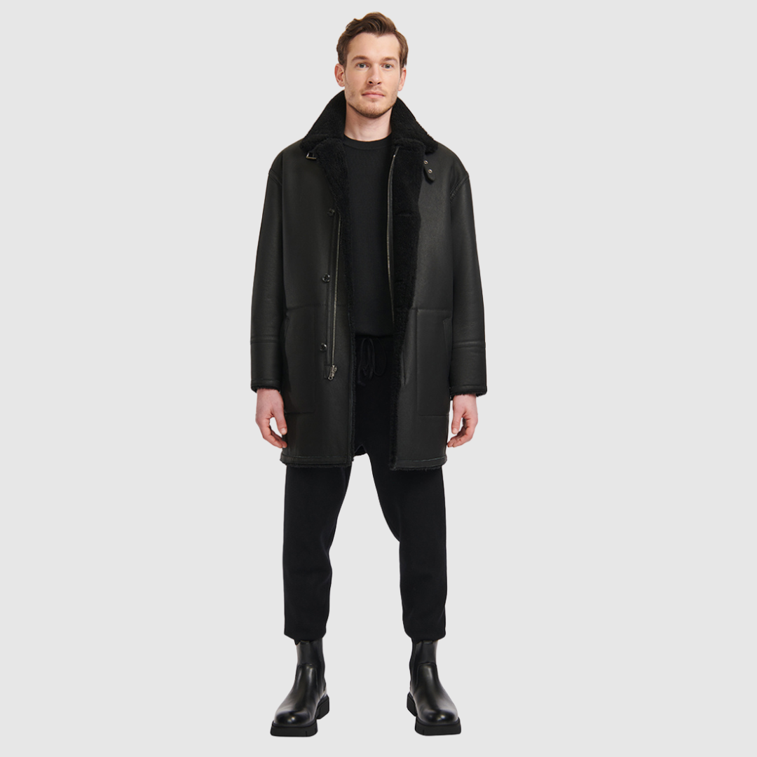 Oversized reversible nappa moto Reverses to a curly wool teddy Drop shoulder Oversized fit through shoulders, arms and body Notch collar with buckle details Single welt side pockets on nappa side Patch side pockets on curly wool teddy side Front zip and button closure