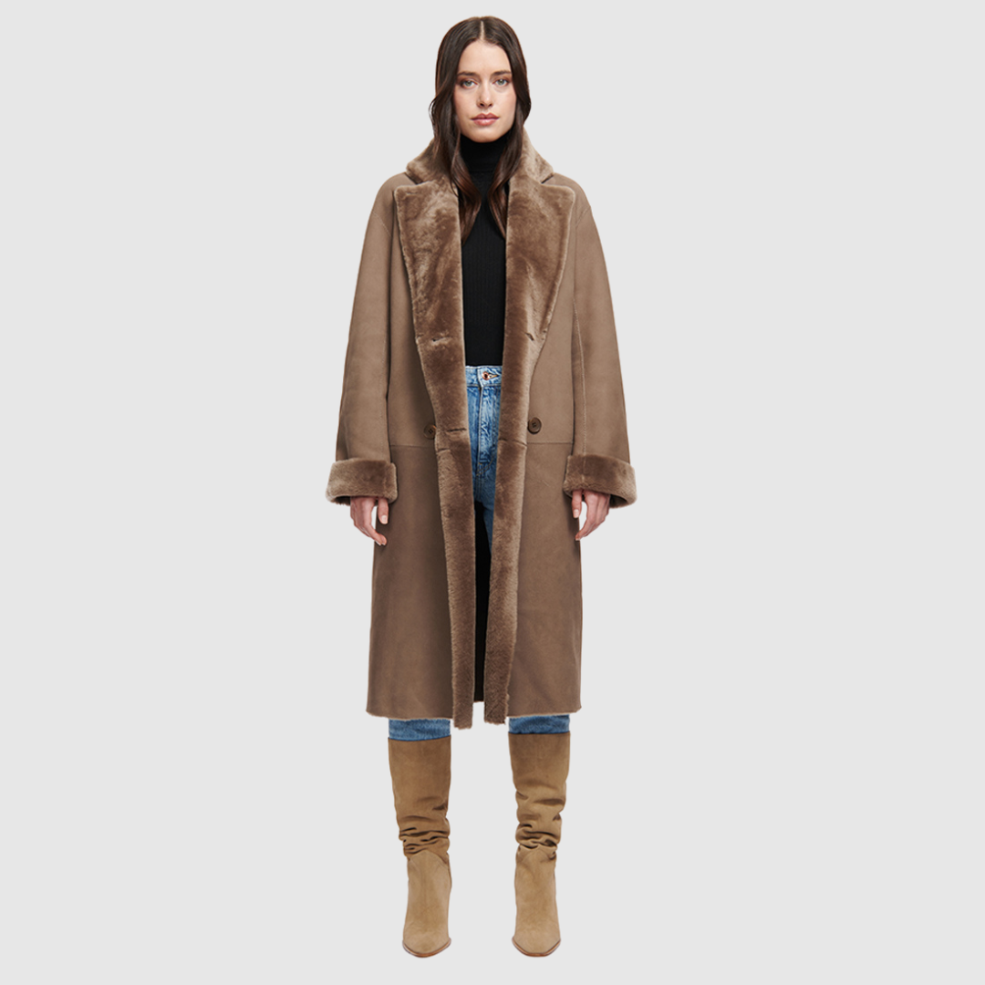 Reversible suede loose fitting coat Reverses to iron wool teddy Slight drop shoulder Double breasted button closure