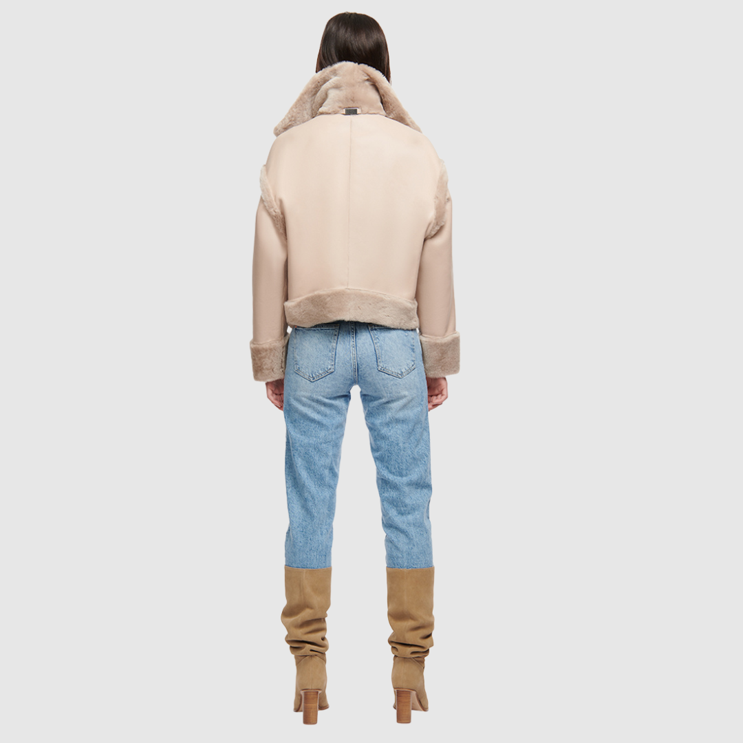 Reversible oversized cropped jacket Ironed wool and nappa combination Drop shoulder Tapered at hem Standard front zip closure Side and interior zip pockets