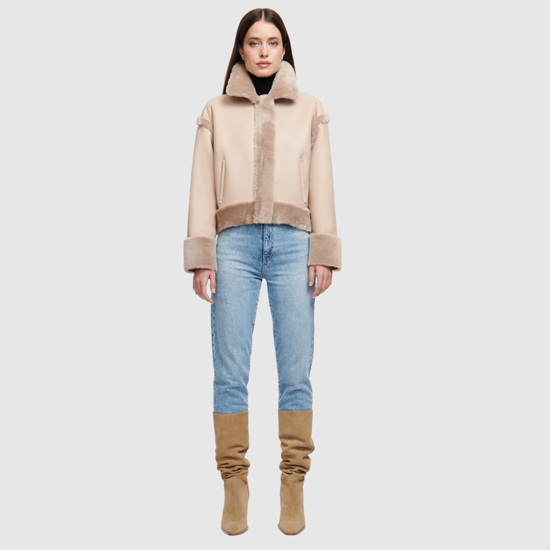 Reversible oversized cropped jacket Ironed wool and nappa combination Drop shoulder Tapered at hem Standard front zip closure Side and interior zip pockets