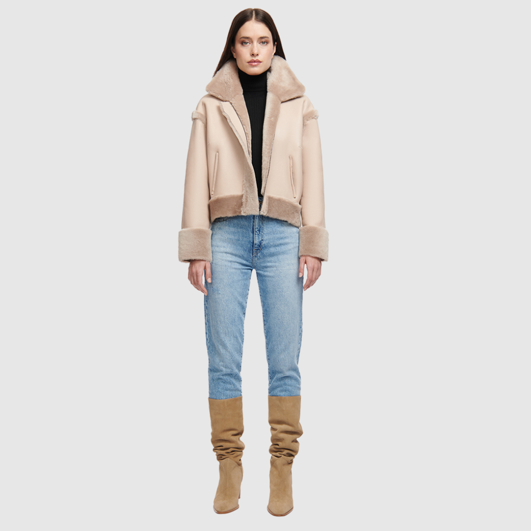 Reversible oversized cropped jacket Ironed wool and nappa combination Drop shoulder Tapered at hem Standard front zip closure Side and interior zip pockets