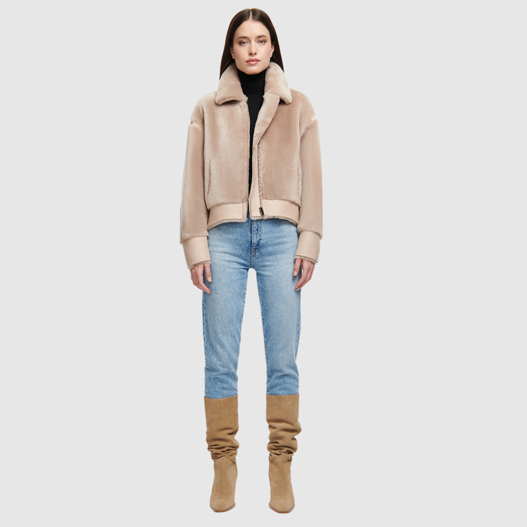 Reversible oversized cropped jacket Ironed wool and nappa combination Drop shoulder Tapered at hem Standard front zip closure Side and interior zip pockets