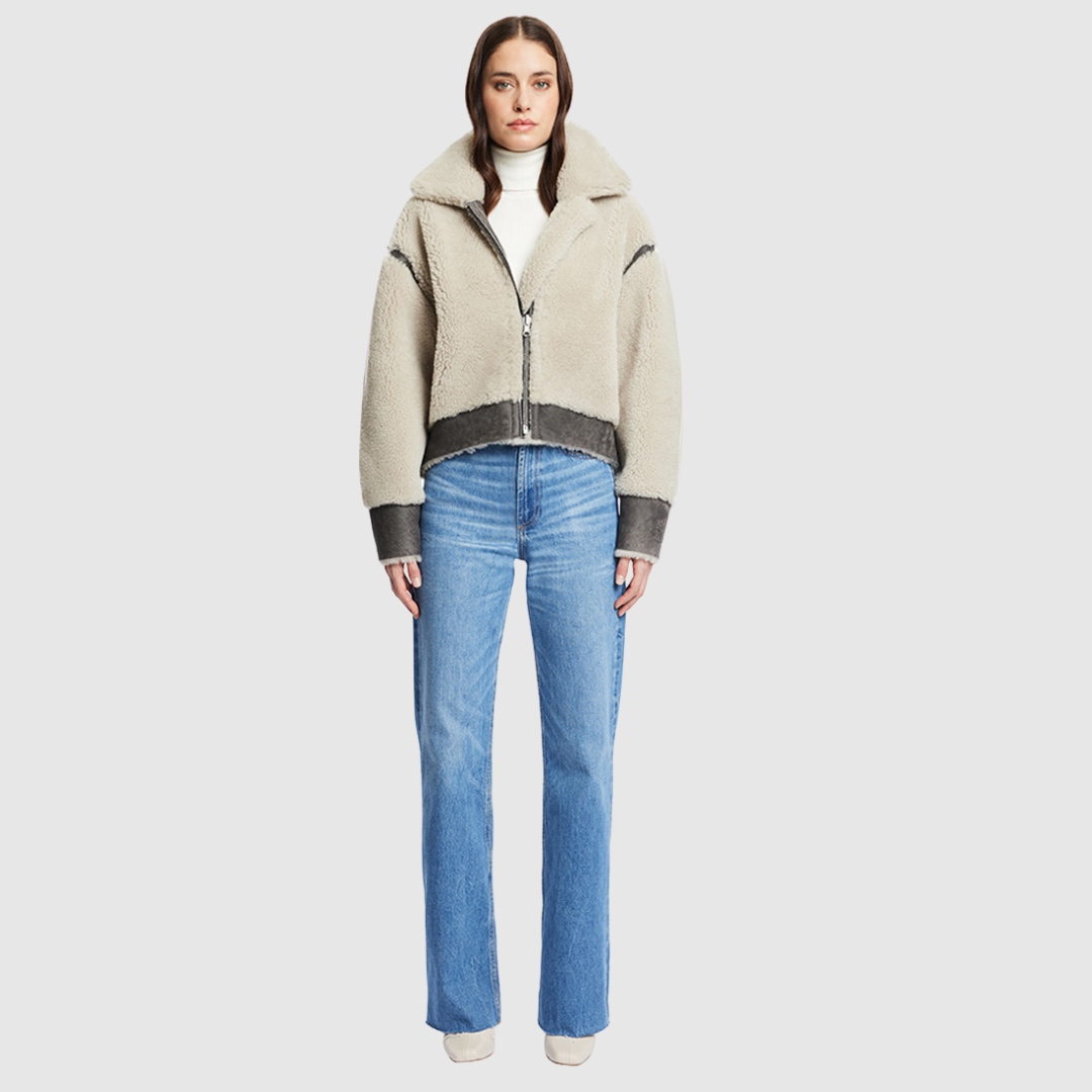 Reversible oversized cropped jacket curly wool and suede combination Drop shoulder Tapered at hem Standard front zip closure Side and interior zip pockets