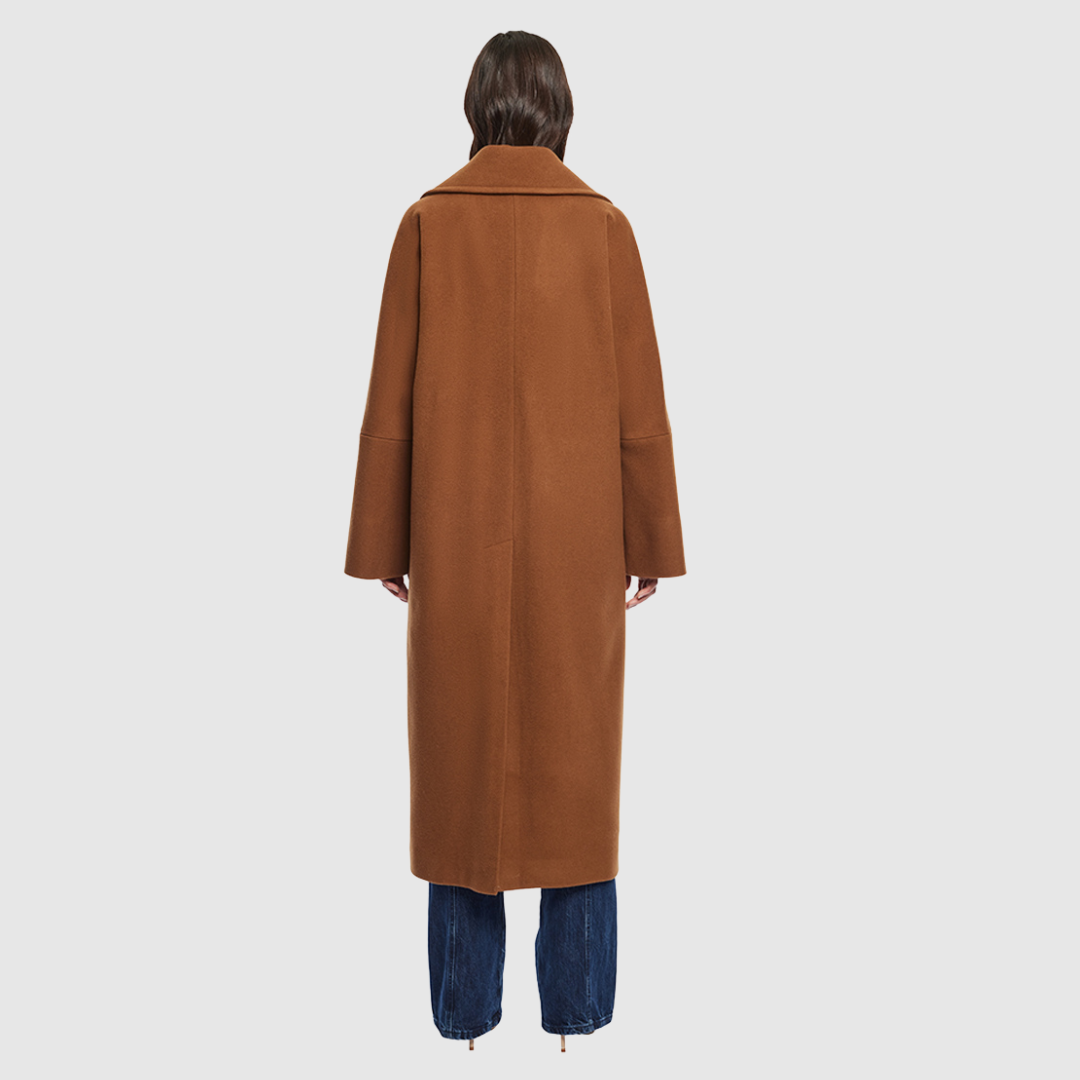 Italian wool cashmere blend Double breasted Drop shoulder Oversized fit through shoulders, arms and torso Large notch collar Back vent Single welt pockets