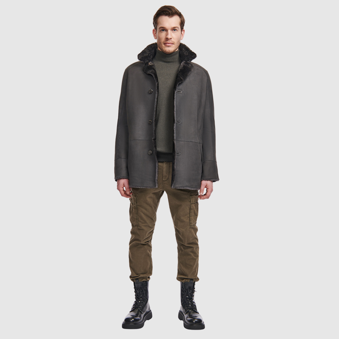 The Josh Grey Ale Reversible Shearling Jacket embodies modern versatility with heritage-inspired tailoring. Crafted in supple suede and fully reversible to a textured ironed wool teddy, it offers two distinct looks in one. Structured and streamlined when worn wool-in, or relaxed and easy when worn wool-out, this piece adapts effortlessly to changing moods and occasions. Finished with a notch collar, raw edge detailing, and functional slash pockets on both sides, Josh delivers understated luxury.