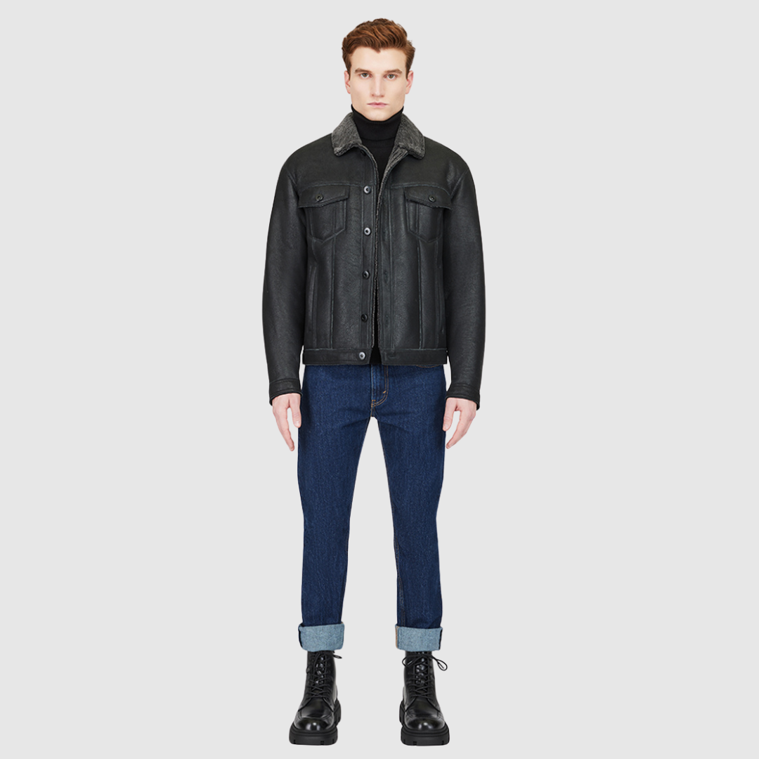 Semi-suede with curly wool collar Regular shoulder Fitted through shoulders and chest Notch collar Buttoned cuffs and chest pockets Interior pouch pocket Single welt side pockets Front button closure