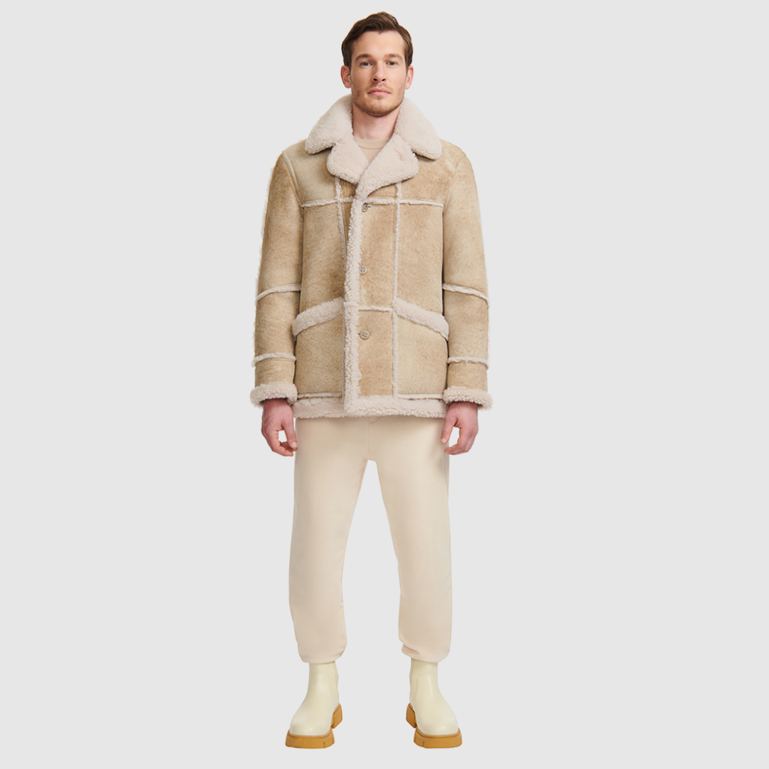 Mixed media parka Slightly oversized fit Contrast curly wool out detail Regular shoulder Zip closure Oversized patch pockets