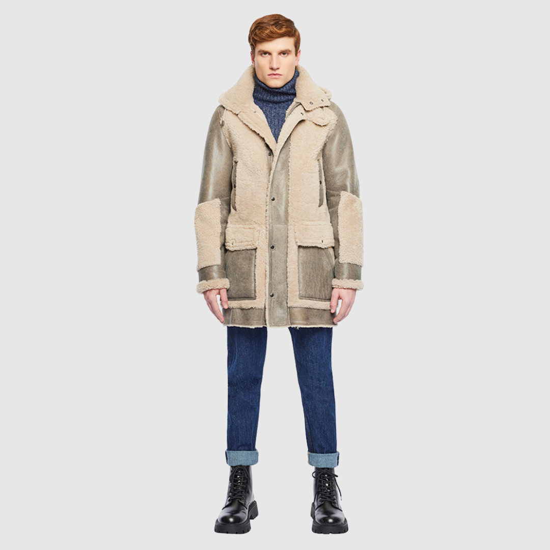 Mixed media parka Slightly oversized fit Removable hood Contrast curly wool out detail Regular shoulder Zip closure Oversized patch pockets