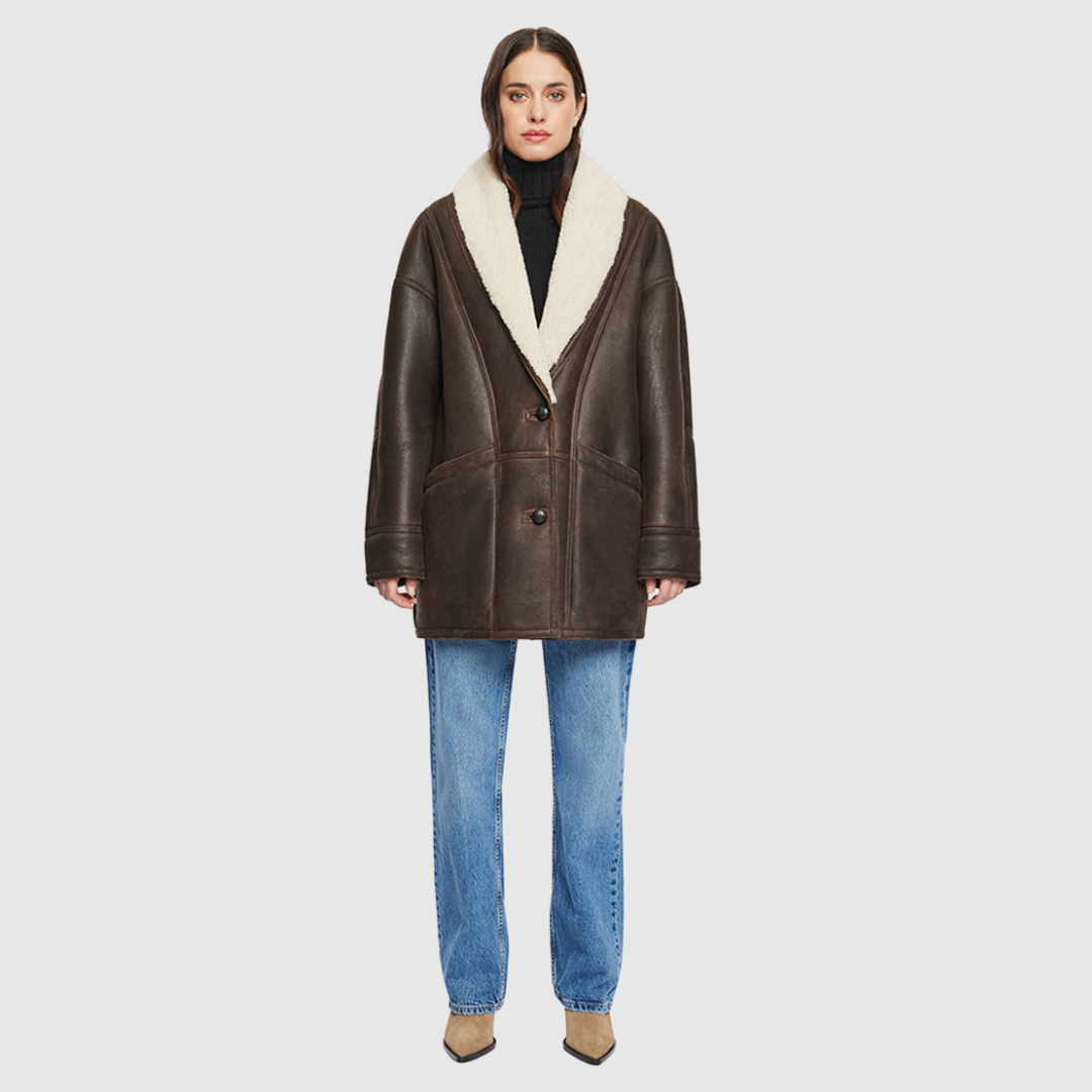 Oversized 80's inspired nappa jacket Drop shoulder Deep armholes and wide sleeves Curly wool shawl collar Interior zip pocket Patch side pockets Front button closure