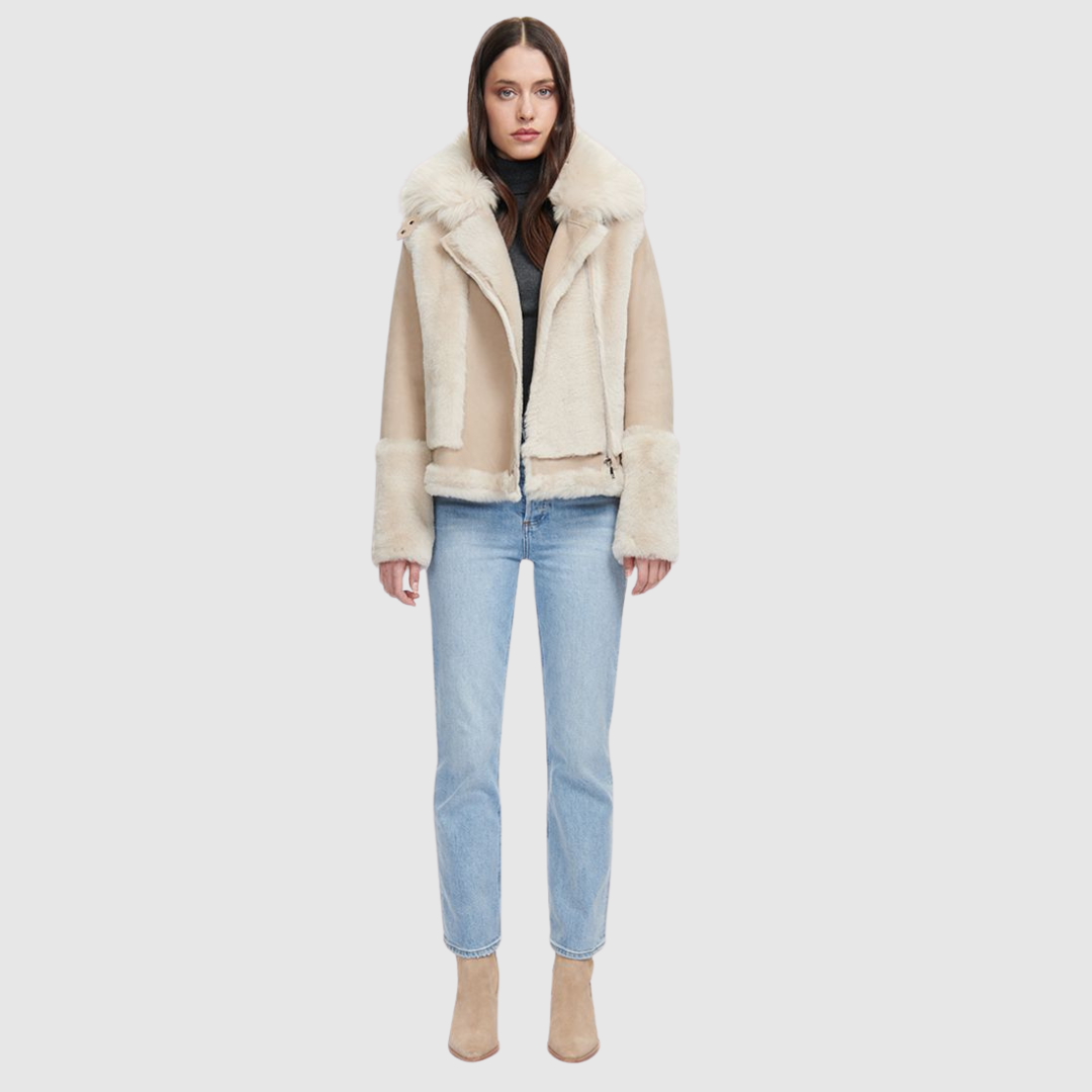 Soft wool on sleek suede moto Drop shoulder Wool out cuff detail & sheared wool body and sleeves Toscana long wool collar with double buckle detail Asymmetrical front zip closure Side and interior zip pockets