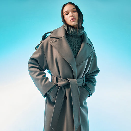 Wool. Inspired to be the favorite cold-weather go-to this elongated wool trench coat is fashioned for unbeatable warmth and relaxed front double-breasted belted closure, peaked lapels. Front welt pockets. Lined. 