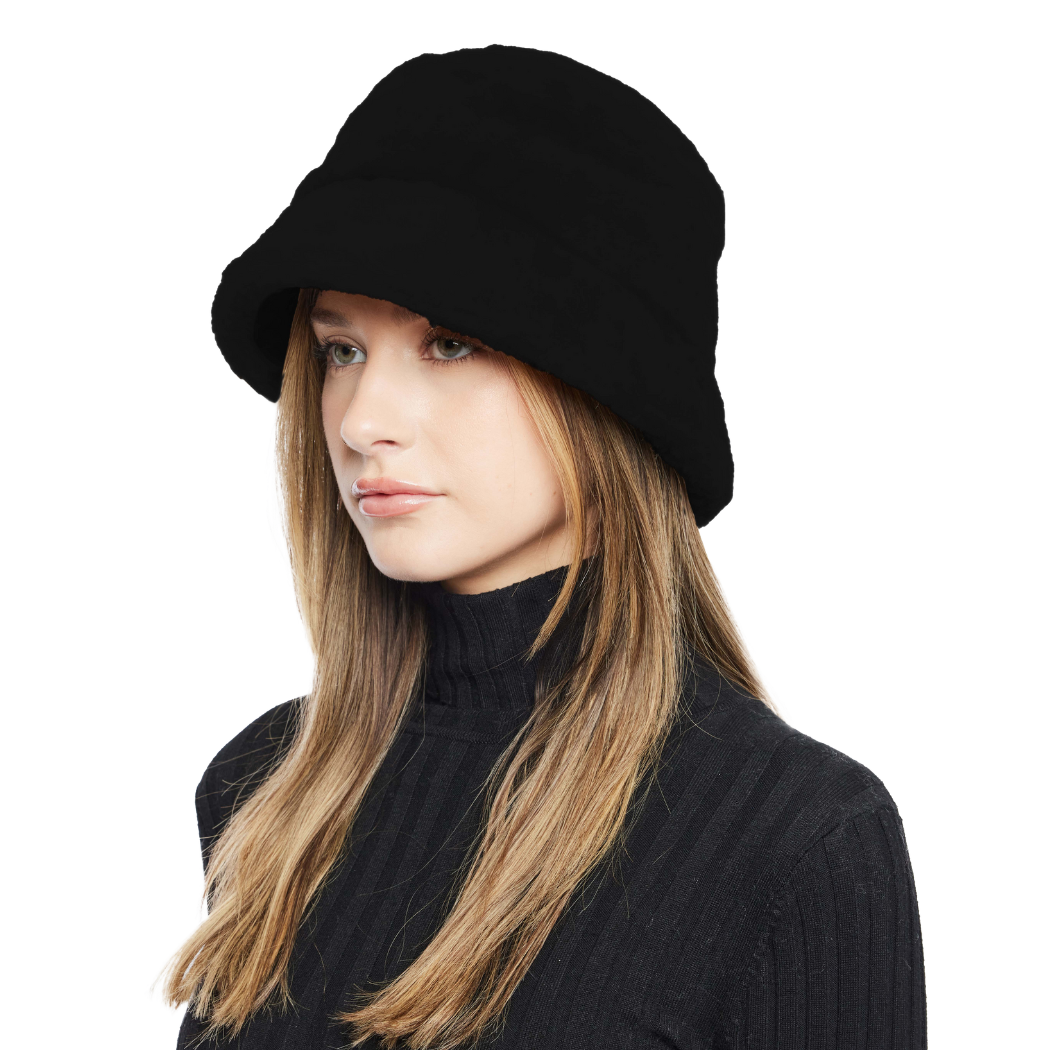 Elevate winter style with our Black Shearling Bucket Hat. Featuring an ironed wool exterior and inner brim, fully lined for warmth and comfort. Crafted with luxurious shearling, this designer accessory combines sophistication with practicality. Stay cozy and chic in cold weather, making a fashion statement with premium quality.