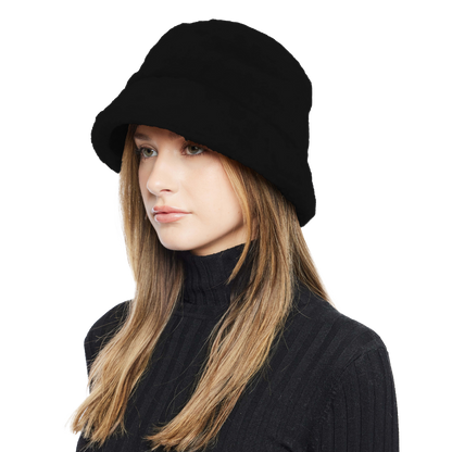 Elevate winter style with our Black Shearling Bucket Hat. Featuring an ironed wool exterior and inner brim, fully lined for warmth and comfort. Crafted with luxurious shearling, this designer accessory combines sophistication with practicality. Stay cozy and chic in cold weather, making a fashion statement with premium quality.