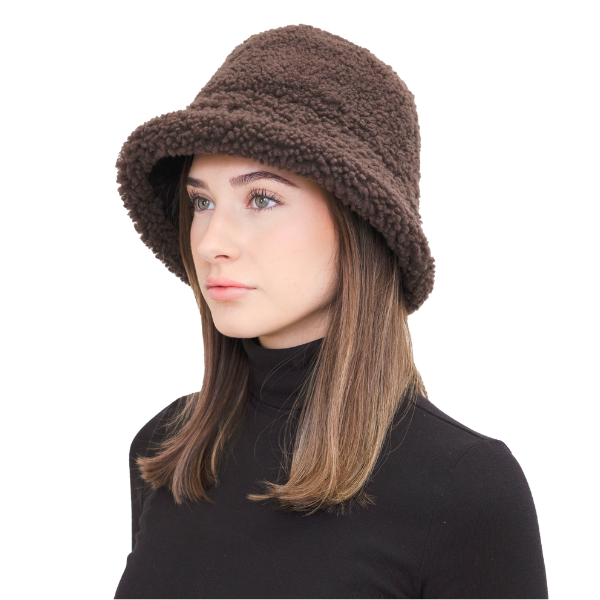 Elevate your winter style with our reversible Chestnut/Black Shearling Curly Wool Bucket Hat. Crafted from luxurious shearling and nylon with topstitching, this designer accessory offers versatility and warmth. Embrace premium quality and sophistication while staying cozy in chilly weather. A must-have addition to your cold-weather wardrobe.