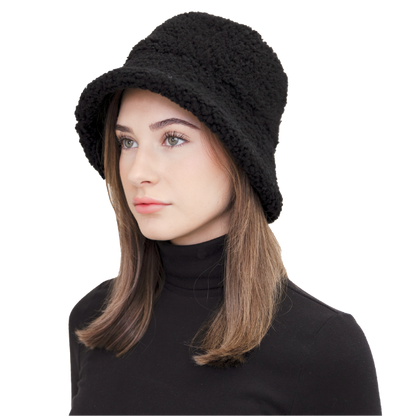 Elevate winter style with our reversible Black Shearling Curly Wool Bucket Hat. Crafted from luxurious shearling and wool, it reverses to durable nylon with topstitching for versatility. Stay warm and stylish with this designer accessory, perfect for cold-weather adventures. Embrace premium quality and fashion-forward design this winter.