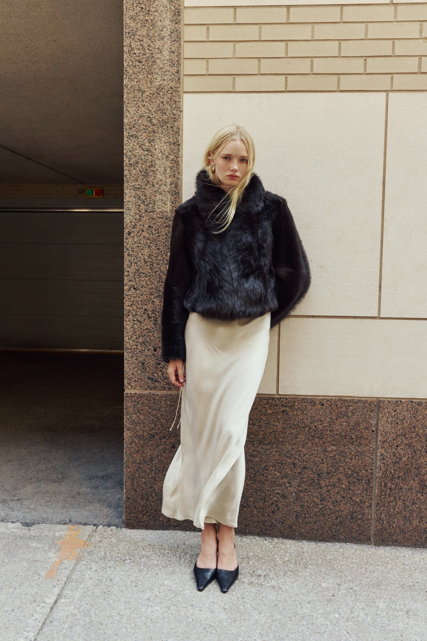 The HOPE Jacket is a versatile statement piece, crafted in chocolate toscana shearling with a modern cropped cut. Designed with a wool-out teddy finish, it reverses to a sleek nappa-out jacket, offering two looks in one. The relaxed shoulder and spread collar create a casual yet elevated silhouette, while slash side pockets add functionality. Finished with a front zip closure, HOPE is the perfect blend of cozy texture and polished edge.