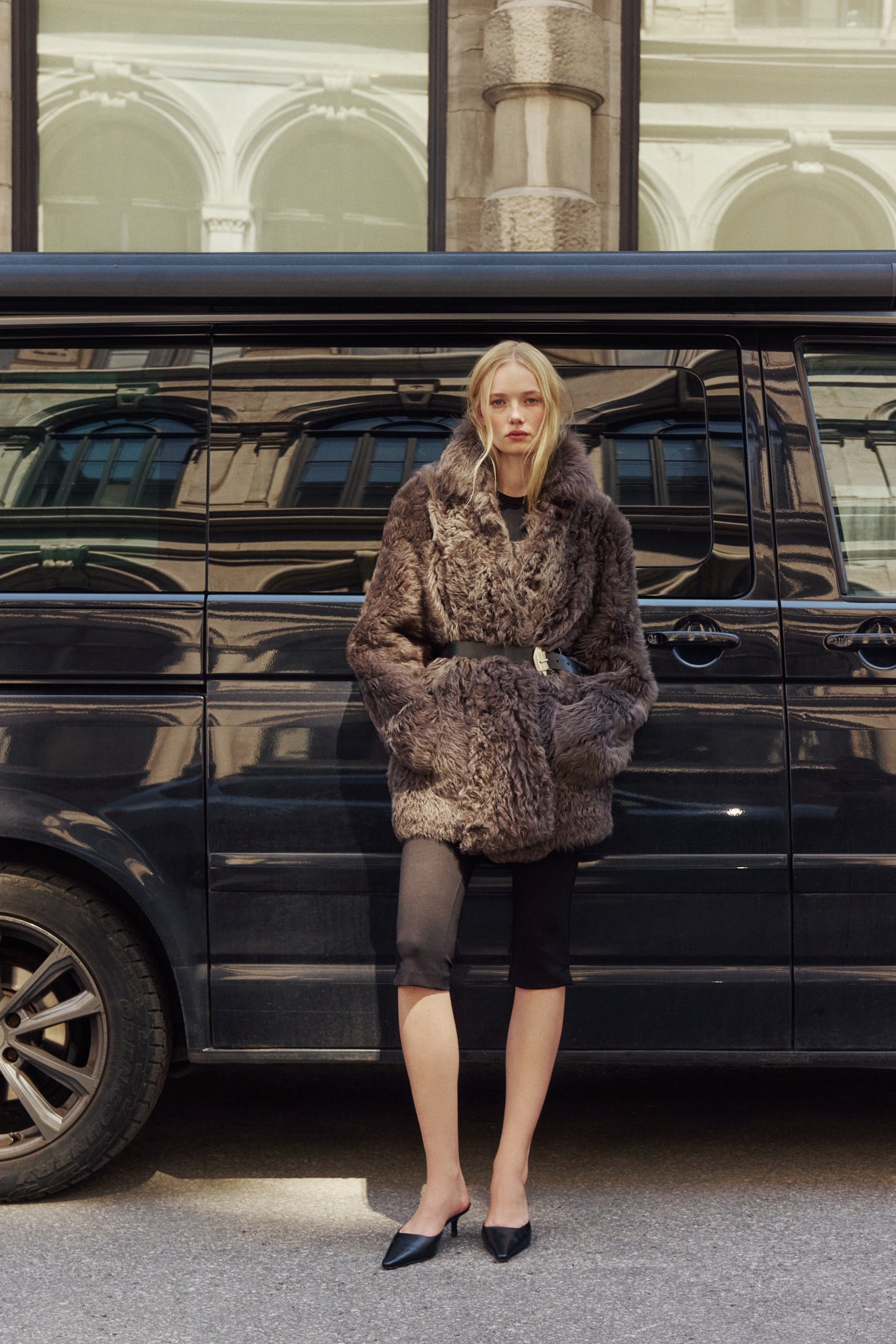 The HiSO MILKY WAY Jacket is a heritage-inspired mid-length shearling coat, masterfully crafted from premium Toscana shearling for unparalleled texture and depth. Its regular shoulder and relaxed mid-length silhouette create an elegant, contemporary fit, while the spread collar frames the face with plush, long-haired wool. Designed with a versatile, reversible construction, this statement coat provides two distinctive looks in one