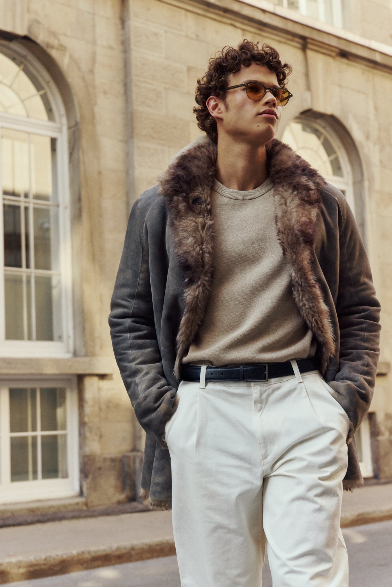 JOSH is a reversible shearling relaxed fitting suede coat Reverses to iron wool teddy  Drop shoulder When worn wool in, fitted on the shoulders and chest, straight cut through the torso When worn wool out, relaxed fit through the shoulder and body Notch collar Raw edge finish Single breasted 3 button closure Slash side pockets on both suede side and reversed iron wool side 