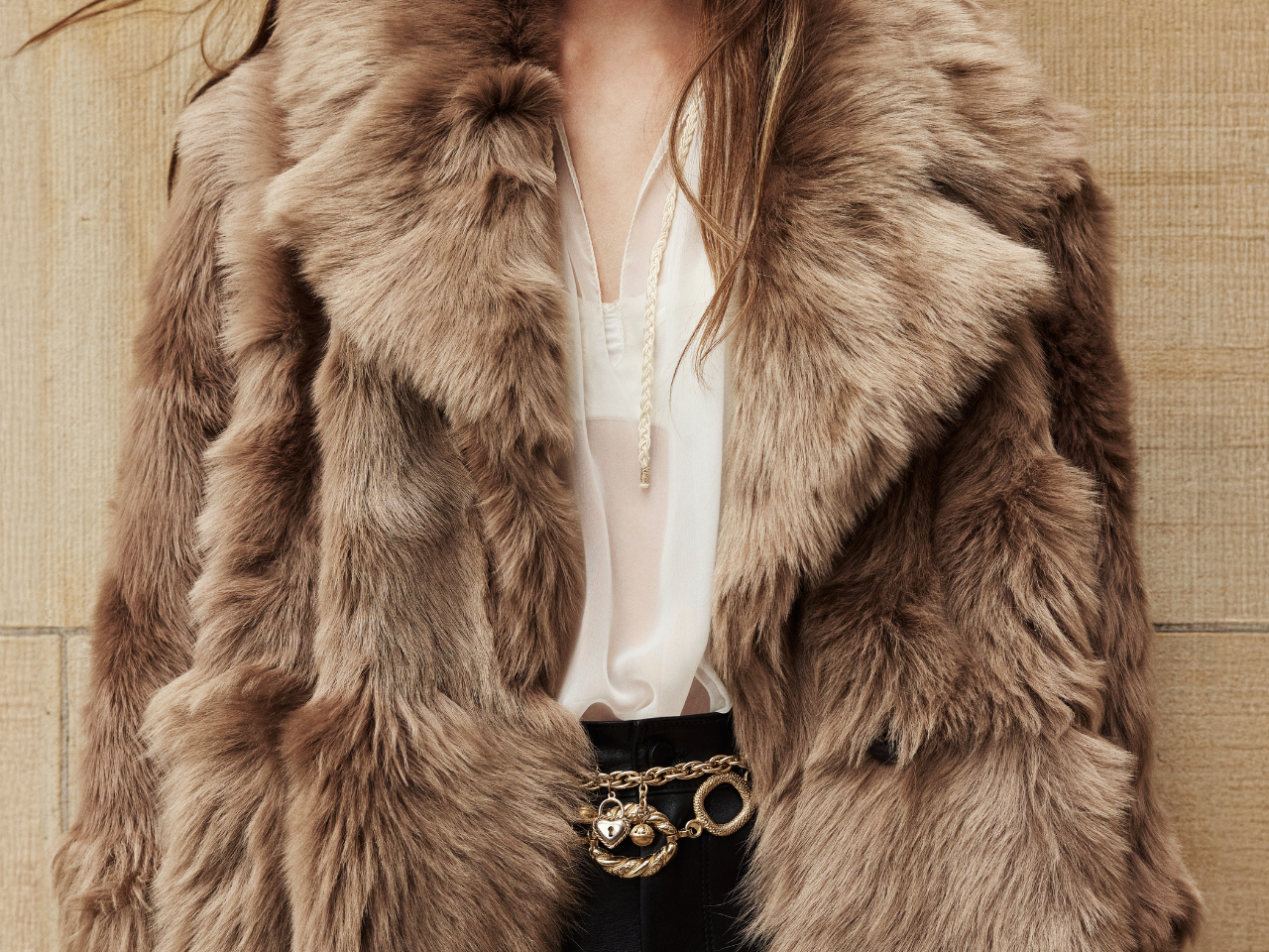 The SEER Jacket is a luxurious oversized outerwear piece crafted in Latte Toscana wool-out teddy. Designed with a structured shoulder and oversized Toscana notch collar, it delivers a bold, elevated silhouette. Fully lined for comfort, the jacket features slash side pockets for functionality and a single-breasted button closure for a polished finish. SEER combines plush texture with timeless tailoring for a standout cold-weather essential.