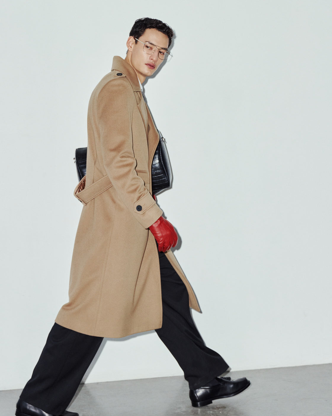 The JOSEPH Coat is a heritage-inspired longline double-breasted coat crafted in rich camel wool cashmere. Designed for a regular-fit fit with structured shoulders, wide peaked lapels, shoulder epaulets, and a straight fit, JOSEPH combines classic military tailoring with modern luxury. Functional flap side pockets with ticket pocket detailing, cuff tabs, and a double-breasted button closure make this coat as practical as it is versatile, perfect for elevated city styling or sharp cold-weather tailoring.