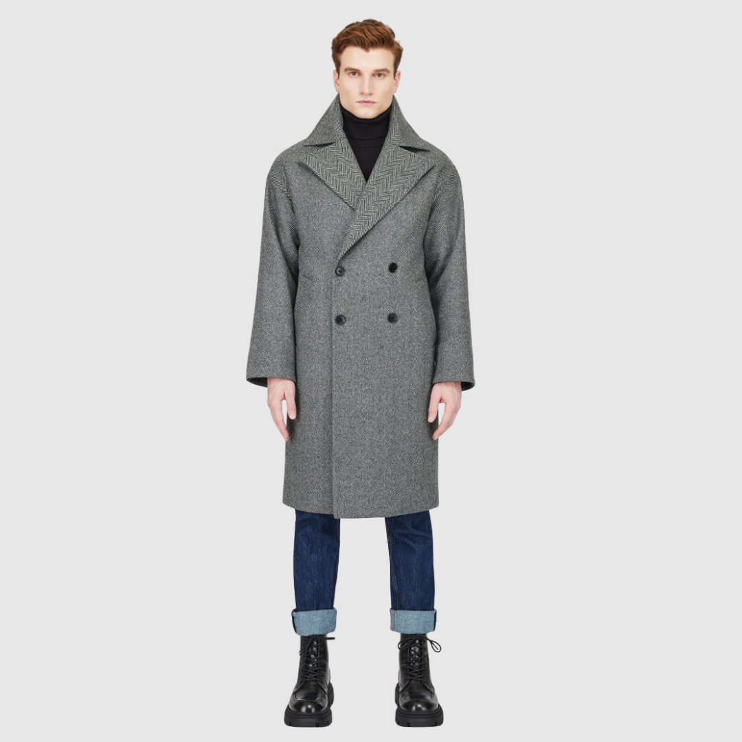 The James Herringbone Wool Cashmere Jacket is a luxurious Italian wool-cashmere blend designed for refined winter layering. Its double-breasted silhouette with drop shoulders and relaxed kimono gusset sleeves creates a sophisticated, heritage-inspired profile. Featuring a large notch collar, back vent, and single welt pockets, James offers both practicality and polished style for cold-weather dressing.