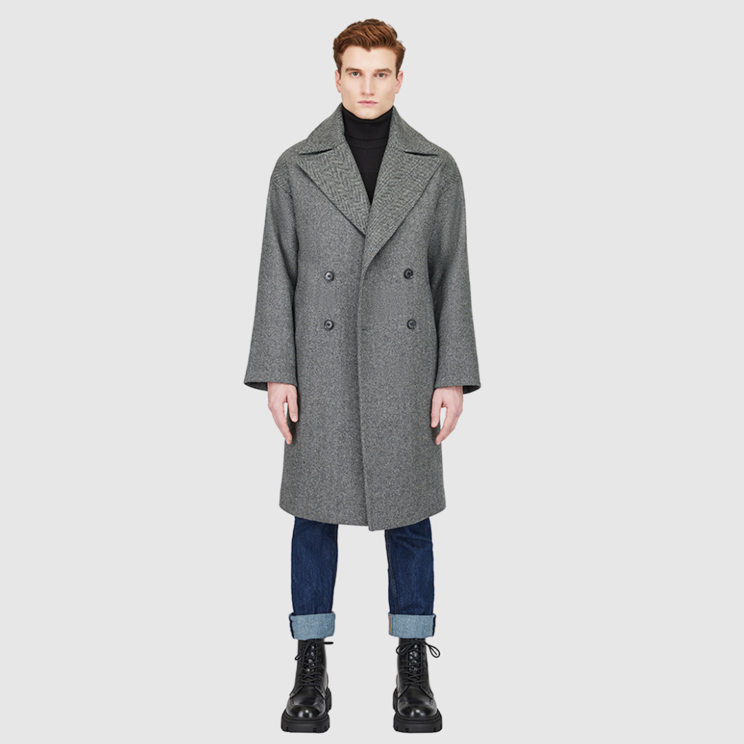 The James Herringbone Wool Cashmere Jacket is a luxurious Italian wool-cashmere blend designed for refined winter layering. Its double-breasted silhouette with drop shoulders and relaxed kimono gusset sleeves creates a sophisticated, heritage-inspired profile. Featuring a large notch collar, back vent, and single welt pockets, James offers both practicality and polished style for cold-weather dressing.