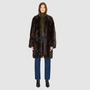 The ALLORA Jacket is a luxury reversible shearling teddy crafted in carbon toscana for a rich and modern finish. Designed as a collarless regular fit silhouette, it effortlessly flips from plush wool-out shearling to a sleek nappa skin-out jacket, offering two looks in one. With its generous fit through the shoulders, arms, and torso, ALLORA balances comfort and style. Functional slash side pockets on both sides and a front snap closure complete this elevated women’s reversible shearling jacket.