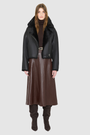 The ARIA Jacket is a luxury women’s shearling moto jacket designed with a reversible cropped silhouette that shifts effortlessly from sleek nappa leather to a plush curly wool teddy. With its drop shoulder and relaxed batwing sleeves, ARIA delivers an edgy yet easy fit that flatters every look. An oversized notch collar brings statement structure, while practical pockets on both sides and an asymmetrical front zip with single button closure ensure both style and function. 