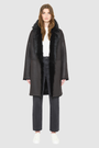 AUGUST is a heritage-inspired reversible medium-length coat crafted with a semi suede and toscana shearling combination. Designed for a relaxed silhouette with drop shoulders, an exaggerated notched collar with plush trim, and a straight fit, AUGUST combines modern edge with timeless texture. Functional slash pockets on the wool side, clean welt pockets on the semi suede side, and a front button closure make this coat as practical as it is versatile, perfect for après-ski layering or elevated city styling.