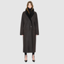 The DANIELLE Duster is a statement in heritage-inspired luxury and modern versatility. Crafted in java semi suede leather and plush curly wool shearling, this reversible oversized coat transitions effortlessly from sleek leather to cozy teddy texture. Its elongated silhouette is enhanced with a slight drop shoulder, back vent, and double-breasted button closure, creating timeless elegance with functional edge. Practical single welt pockets on the semi suede side and slash pockets on the wool side