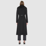 Back view of ESTELLE Black Wool Coat featuring a plush shearling collar, perfect for warm winter layers.