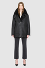 JILL is a heritage-inspired reversible medium-length shearling car coat crafted in jet black matte nappa leather with smooth ironed wool teddy on the reverse. Designed for a relaxed silhouette with regular shoulders, an exaggerated spread collar with adjustable leather strap detail, and a straight fit, JILL combines modern edge with timeless texture. Functional deep patch pockets on the wool side, clean welt pockets on the nappa side, and a heavy-duty front zip closure 