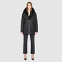 JILL is a heritage-inspired reversible medium-length shearling car coat crafted in jet black matte nappa leather with smooth ironed wool teddy on the reverse. Designed for a relaxed silhouette with regular shoulders, an exaggerated spread collar with adjustable leather strap detail, and a straight fit, JILL combines modern edge with timeless texture. Functional deep patch pockets on the wool side, clean welt pockets on the nappa side, and a heavy-duty front zip closure 