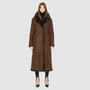 The MAEVE Coat is a heritage-inspired reversible outerwear piece crafted in havanna suede and Toscana rasado teddy. Designed to flip seamlessly from plush wool-out to sleek suede skin-out, it offers versatile styling for both everyday wear and après-ski sophistication. A drop shoulder provides ease of movement, while the fit adapts—regular when worn wool-out and semi-fitted when worn skin-out. An oversized Toscana wool notch collar, slash pockets on the teddy side, and single welt pockets on the suede side