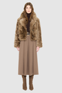 The NIKKI Bomber Jacket is a modern cropped silhouette crafted in luxurious toscana wool. Designed with a drop shoulder and a relaxed fit through the shoulders, arms, and body, it delivers effortless volume and an easy, natural drape. An oversized toscana notch collar and single-breasted button closure give it a clean, minimalist finish, while slash side pockets add everyday functionality. Fully lined for comfort, NIKKI is the ultimate statement jacket for sophisticated cold-weather layering.