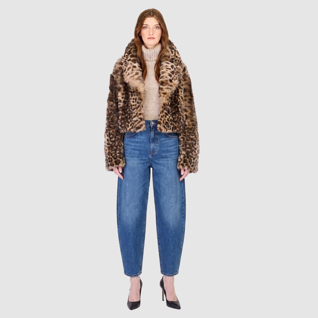 The NIKKI Bomber Jacket is a modern cropped silhouette crafted in luxurious toscana wool. Designed with a drop shoulder and a relaxed fit through the shoulders, arms, and body, it delivers effortless volume and an easy, natural drape. An oversized toscana notch collar and single-breasted button closure give it a clean, minimalist finish, while slash side pockets add everyday functionality. Fully lined for comfort, NIKKI is the ultimate statement jacket for sophisticated cold-weather layering.