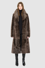 The PANDORA Shearling Coat offers a modern take on the classic long coat, combining rugged function with luxurious texture. Crafted with plush toscana wool shearling, it delivers a timelessly elegant cold-weather look. Designed with a regular shoulder and an oversized notch collar, it masterfully balances structure with relaxed ease. Clean tailored panels and versatile side slit pockets lend utility to this elegant semi-fitted style, making PANDORA ideal for heritage outerwear lovers