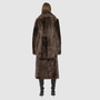 The PANDORA Shearling Coat offers a modern take on the classic long coat, combining rugged function with luxurious texture. Crafted with plush toscana wool shearling, it delivers a timelessly elegant cold-weather look. Designed with a regular shoulder and an oversized notch collar, it masterfully balances structure with relaxed ease. Clean tailored panels and versatile side slit pockets lend utility to this elegant semi-fitted style, making PANDORA ideal for heritage outerwear lovers