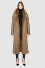 Savvy Craft reversible shearling winter coat displayed on a model, featuring a plush brown exterior and oversized collar.