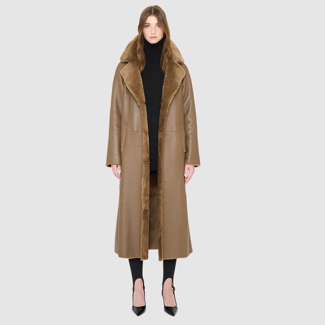 Savvy Craft reversible shearling winter coat displayed on a model, featuring a plush brown exterior and oversized collar.