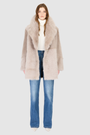 The SEER Jacket is a luxurious oversized outerwear piece crafted in Latte Toscana wool-out teddy. Designed with a structured shoulder and oversized Toscana notch collar, it delivers a bold, elevated silhouette. Fully lined for comfort, the jacket features slash side pockets for functionality and a single-breasted button closure for a polished finish. SEER combines plush texture with timeless tailoring for a standout cold-weather essential.