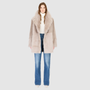The SEER Jacket is a luxurious oversized outerwear piece crafted in Latte Toscana wool-out teddy. Designed with a structured shoulder and oversized Toscana notch collar, it delivers a bold, elevated silhouette. Fully lined for comfort, the jacket features slash side pockets for functionality and a single-breasted button closure for a polished finish. SEER combines plush texture with timeless tailoring for a standout cold-weather essential.